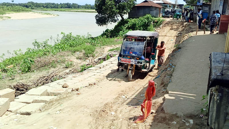 মনু নদীতে বিলীনের পথে শতবর্ষী কাউকাপন বাজার